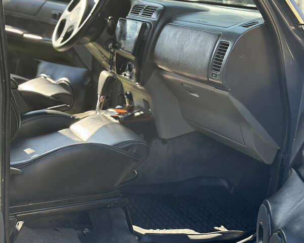 Серый Ниссан Патрол, объемом двигателя 2.5 л и пробегом 200 тыс. км за 66006 $, фото 10 на Automoto.ua