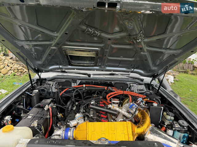 Серый Ниссан Патрол, объемом двигателя 2.5 л и пробегом 200 тыс. км за 66006 $, фото 18 на Automoto.ua