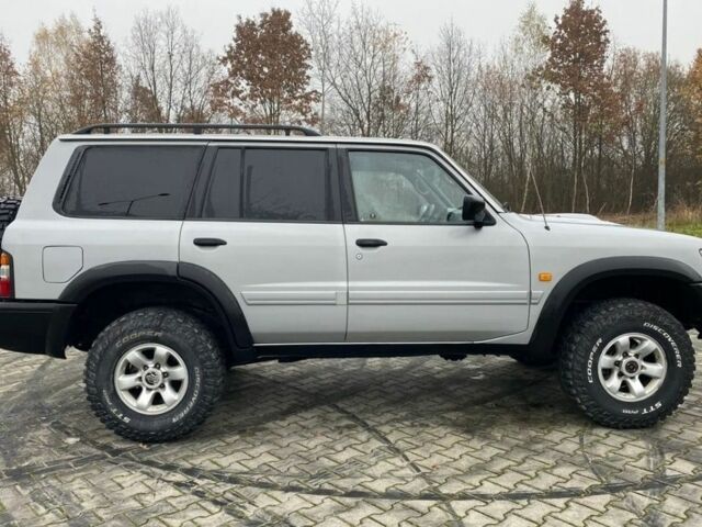 Серый Ниссан Патрол, объемом двигателя 3 л и пробегом 200 тыс. км за 4000 $, фото 7 на Automoto.ua