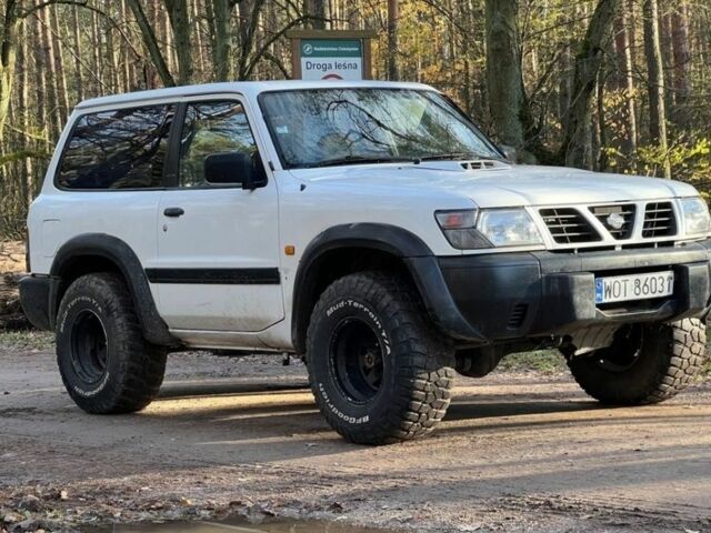 Серый Ниссан Патрол, объемом двигателя 3 л и пробегом 230 тыс. км за 3100 $, фото 2 на Automoto.ua