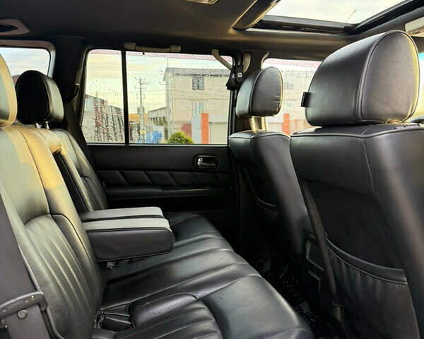 Серый Ниссан Патрол, объемом двигателя 2.95 л и пробегом 369 тыс. км за 19000 $, фото 2 на Automoto.ua