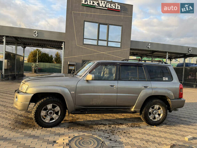 Серый Ниссан Патрол, объемом двигателя 2.95 л и пробегом 369 тыс. км за 19000 $, фото 6 на Automoto.ua