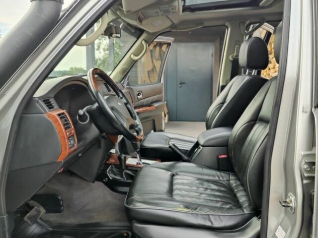 Серый Ниссан Патрол, объемом двигателя 3 л и пробегом 140 тыс. км за 19500 $, фото 5 на Automoto.ua