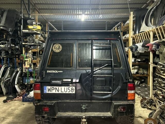 Синий Ниссан Патрол, объемом двигателя 2.8 л и пробегом 300 тыс. км за 6900 $, фото 3 на Automoto.ua