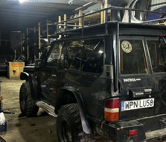 Синий Ниссан Патрол, объемом двигателя 2.8 л и пробегом 300 тыс. км за 6900 $, фото 11 на Automoto.ua