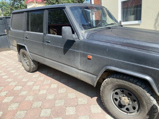 Синий Ниссан Патрол, объемом двигателя 2.8 л и пробегом 221 тыс. км за 2500 $, фото 1 на Automoto.ua