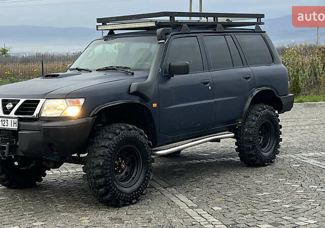 Синий Ниссан Патрол, объемом двигателя 2.83 л и пробегом 290 тыс. км за 14500 $, фото 5 на Automoto.ua