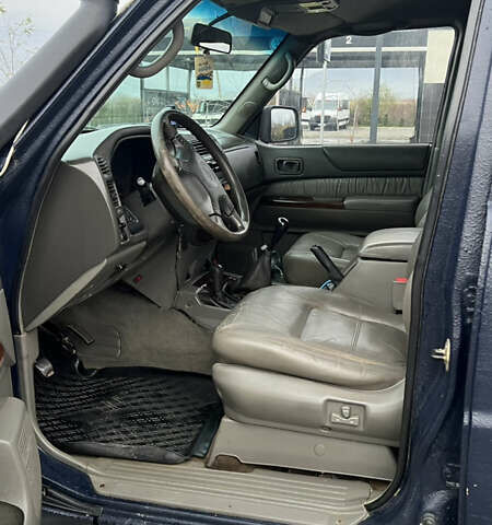 Синий Ниссан Патрол, объемом двигателя 2.83 л и пробегом 290 тыс. км за 14500 $, фото 14 на Automoto.ua