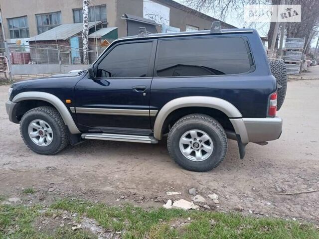Синий Ниссан Патрол, объемом двигателя 2.8 л и пробегом 198 тыс. км за 16700 $, фото 14 на Automoto.ua