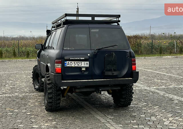 Синий Ниссан Патрол, объемом двигателя 2.83 л и пробегом 290 тыс. км за 14500 $, фото 8 на Automoto.ua