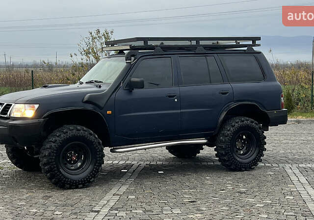 Синий Ниссан Патрол, объемом двигателя 2.83 л и пробегом 290 тыс. км за 14500 $, фото 6 на Automoto.ua