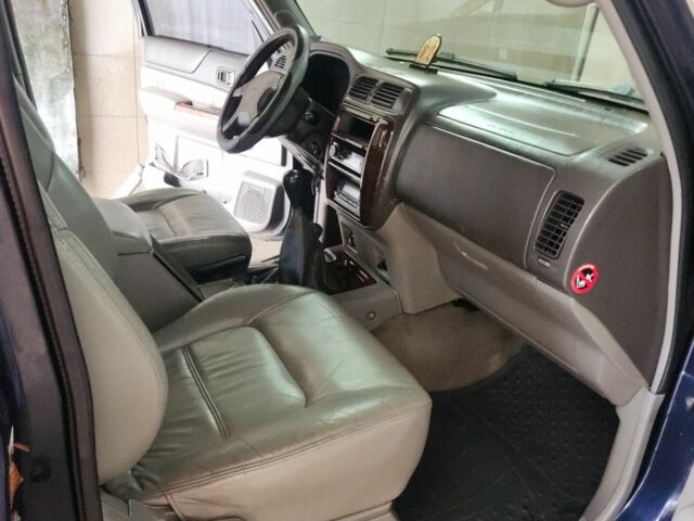 Синий Ниссан Патрол, объемом двигателя 3 л и пробегом 221 тыс. км за 18500 $, фото 5 на Automoto.ua