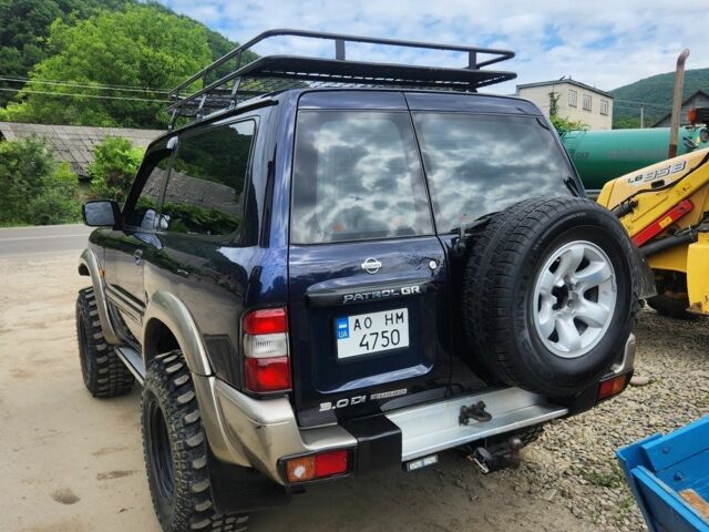 Синий Ниссан Патрол, объемом двигателя 3 л и пробегом 221 тыс. км за 18500 $, фото 1 на Automoto.ua