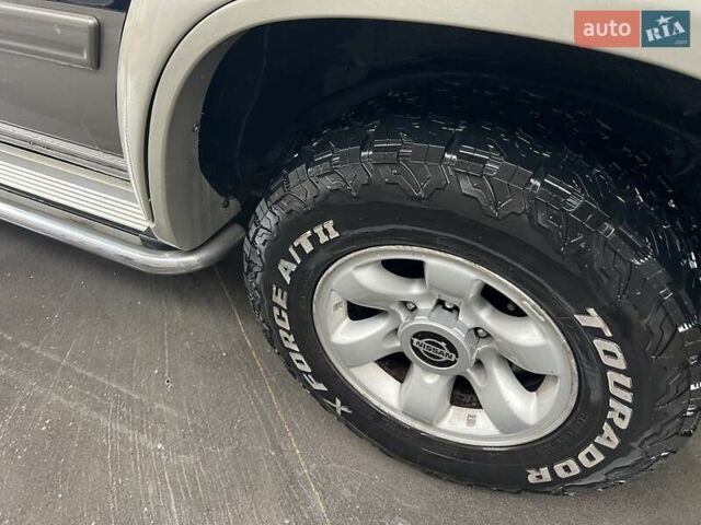 Синий Ниссан Патрол, объемом двигателя 3 л и пробегом 390 тыс. км за 12500 $, фото 5 на Automoto.ua