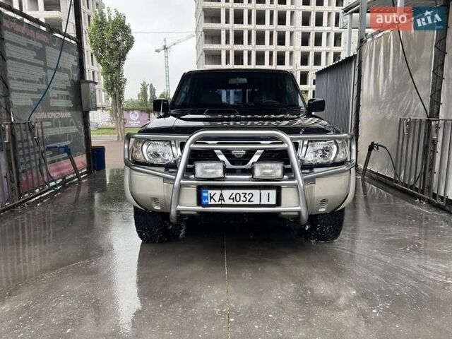Синий Ниссан Патрол, объемом двигателя 3 л и пробегом 390 тыс. км за 12500 $, фото 1 на Automoto.ua