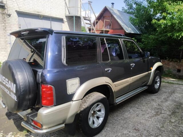Синий Ниссан Патрол, объемом двигателя 0 л и пробегом 169 тыс. км за 13000 $, фото 2 на Automoto.ua