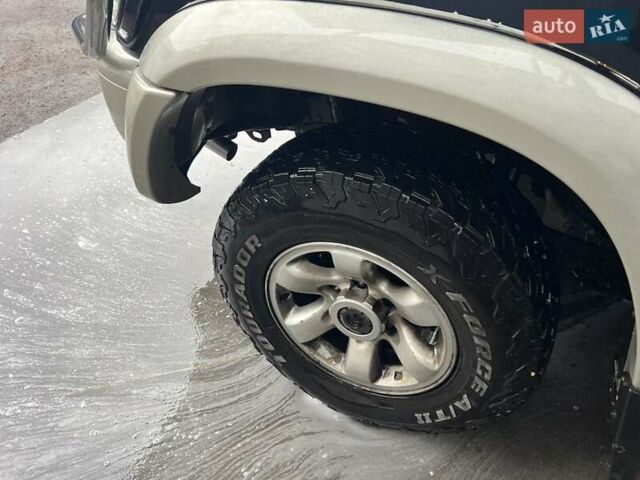 Синий Ниссан Патрол, объемом двигателя 3 л и пробегом 390 тыс. км за 12500 $, фото 4 на Automoto.ua