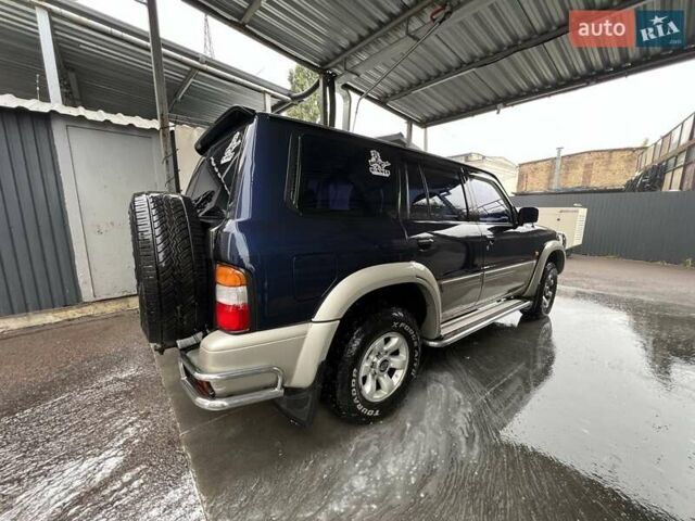 Синий Ниссан Патрол, объемом двигателя 3 л и пробегом 390 тыс. км за 12500 $, фото 6 на Automoto.ua