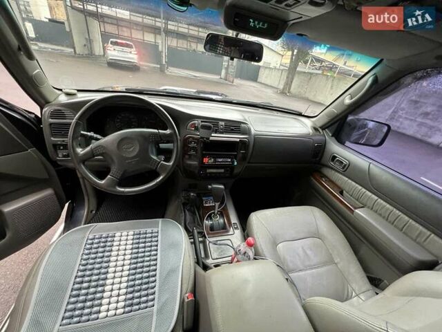 Синий Ниссан Патрол, объемом двигателя 3 л и пробегом 390 тыс. км за 12500 $, фото 10 на Automoto.ua