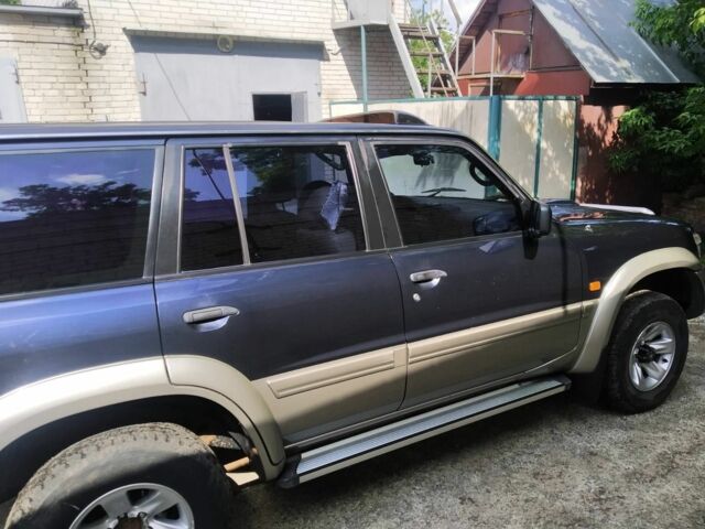 Синий Ниссан Патрол, объемом двигателя 0 л и пробегом 169 тыс. км за 13000 $, фото 1 на Automoto.ua