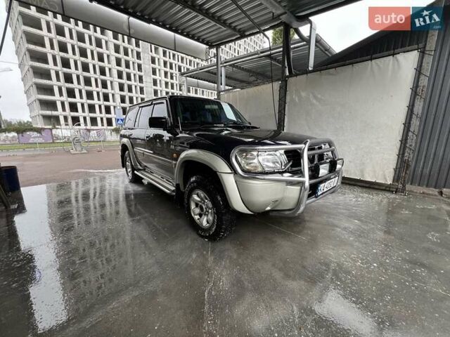 Синий Ниссан Патрол, объемом двигателя 3 л и пробегом 390 тыс. км за 12500 $, фото 2 на Automoto.ua