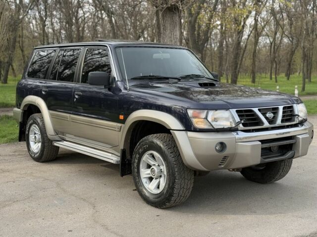 Синий Ниссан Патрол, объемом двигателя 3 л и пробегом 312 тыс. км за 10550 $, фото 8 на Automoto.ua