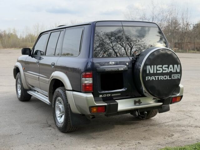 Синий Ниссан Патрол, объемом двигателя 3 л и пробегом 312 тыс. км за 10550 $, фото 4 на Automoto.ua