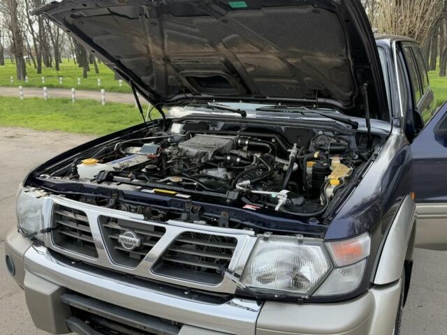 Синий Ниссан Патрол, объемом двигателя 3 л и пробегом 312 тыс. км за 10550 $, фото 11 на Automoto.ua