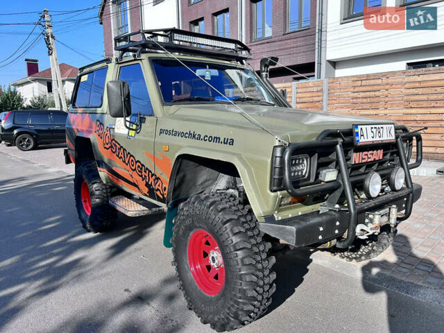 Зеленый Ниссан Патрол, объемом двигателя 3.2 л и пробегом 283 тыс. км за 12000 $, фото 2 на Automoto.ua