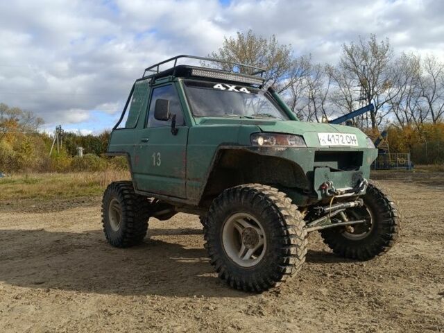 Зелений Ніссан Патрол, об'ємом двигуна 3.3 л та пробігом 250 тис. км за 4750 $, фото 1 на Automoto.ua