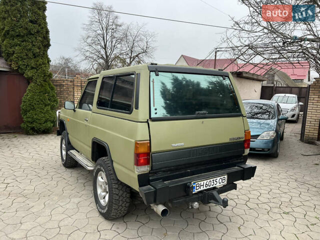 Зеленый Ниссан Патрол, объемом двигателя 2.7 л и пробегом 350 тыс. км за 6700 $, фото 8 на Automoto.ua
