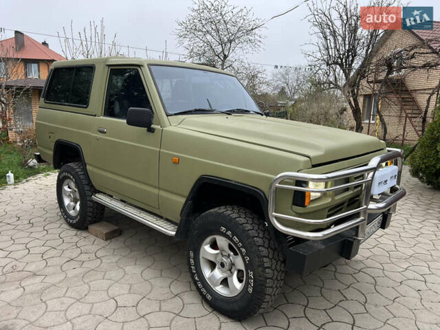 Зеленый Ниссан Патрол, объемом двигателя 2.7 л и пробегом 350 тыс. км за 6700 $, фото 4 на Automoto.ua