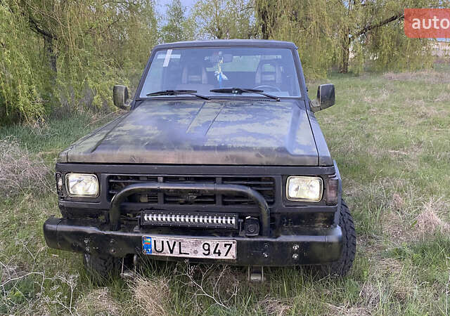 Зеленый Ниссан Патрол, объемом двигателя 2.8 л и пробегом 300 тыс. км за 4197 $, фото 1 на Automoto.ua