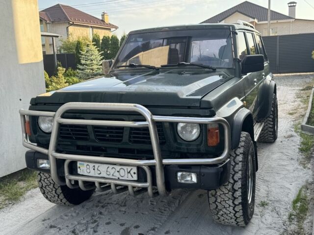 Зеленый Ниссан Патрол, объемом двигателя 2.8 л и пробегом 350 тыс. км за 5900 $, фото 2 на Automoto.ua