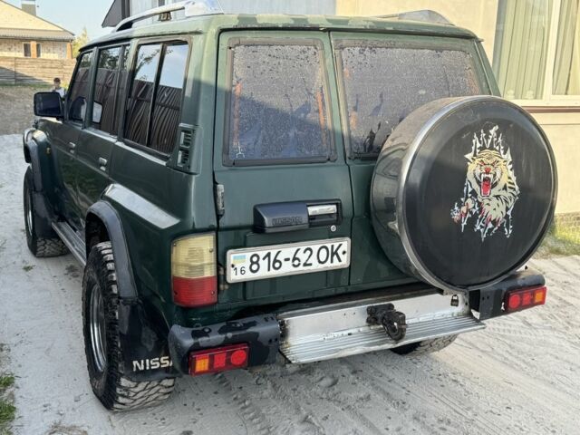 Зеленый Ниссан Патрол, объемом двигателя 2.8 л и пробегом 350 тыс. км за 5900 $, фото 4 на Automoto.ua
