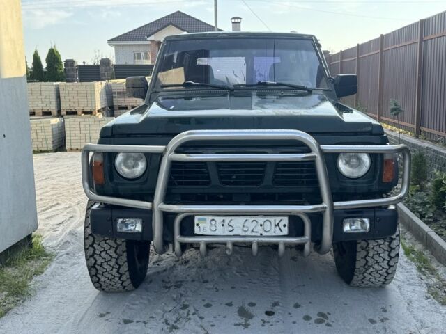 Зеленый Ниссан Патрол, объемом двигателя 2.8 л и пробегом 350 тыс. км за 5900 $, фото 1 на Automoto.ua