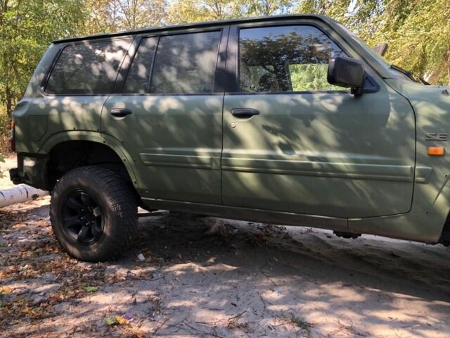 Зеленый Ниссан Патрол, объемом двигателя 2.8 л и пробегом 200 тыс. км за 11000 $, фото 2 на Automoto.ua