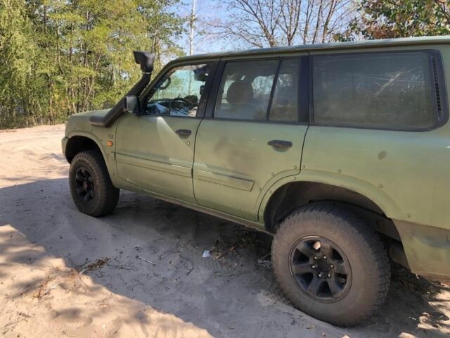Зеленый Ниссан Патрол, объемом двигателя 2.8 л и пробегом 200 тыс. км за 11000 $, фото 4 на Automoto.ua