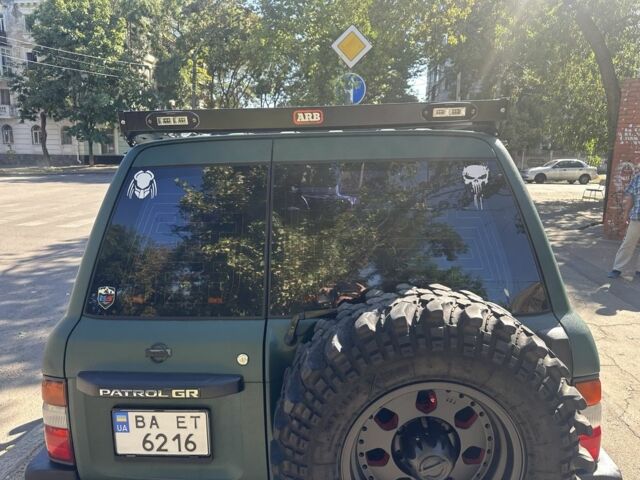 Зеленый Ниссан Патрол, объемом двигателя 4.2 л и пробегом 427 тыс. км за 35000 $, фото 13 на Automoto.ua