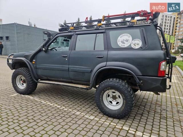 Зелений Ніссан Патрол, об'ємом двигуна 2.8 л та пробігом 198 тис. км за 19999 $, фото 9 на Automoto.ua