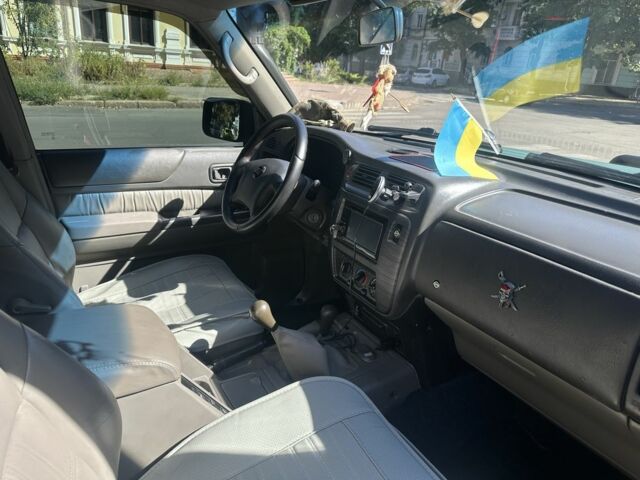 Зеленый Ниссан Патрол, объемом двигателя 4.2 л и пробегом 427 тыс. км за 35000 $, фото 16 на Automoto.ua