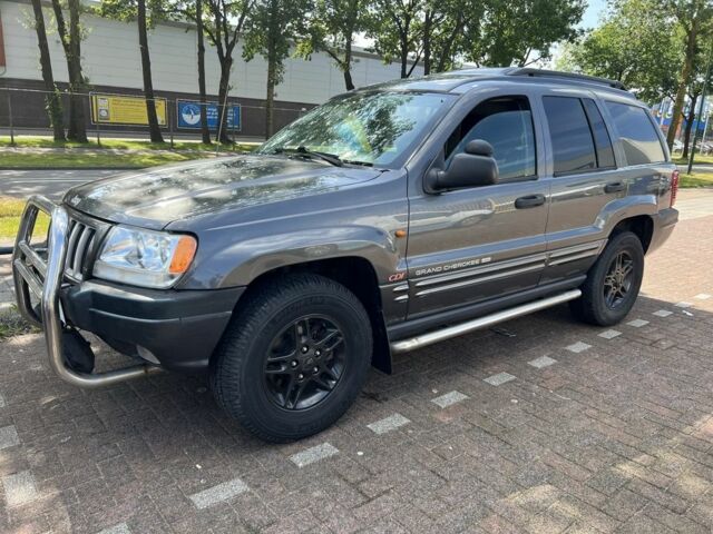 Зеленый Ниссан Патрол, объемом двигателя 3 л и пробегом 300 тыс. км за 7537 $, фото 2 на Automoto.ua