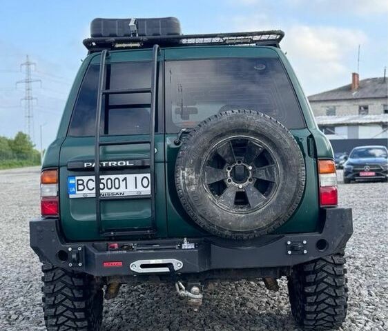 Зелений Ніссан Патрол, об'ємом двигуна 4.5 л та пробігом 150 тис. км за 19700 $, фото 4 на Automoto.ua