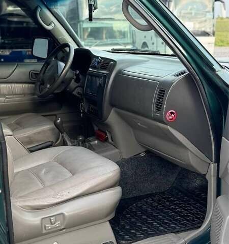 Зелений Ніссан Патрол, об'ємом двигуна 4.5 л та пробігом 150 тис. км за 19700 $, фото 4 на Automoto.ua
