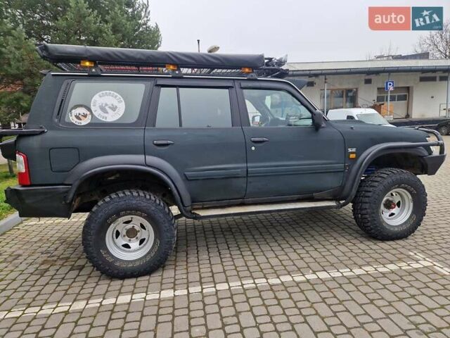 Зелений Ніссан Патрол, об'ємом двигуна 2.8 л та пробігом 198 тис. км за 19999 $, фото 15 на Automoto.ua