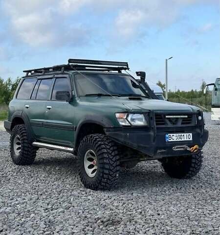 Зелений Ніссан Патрол, об'ємом двигуна 4.5 л та пробігом 150 тис. км за 19700 $, фото 7 на Automoto.ua