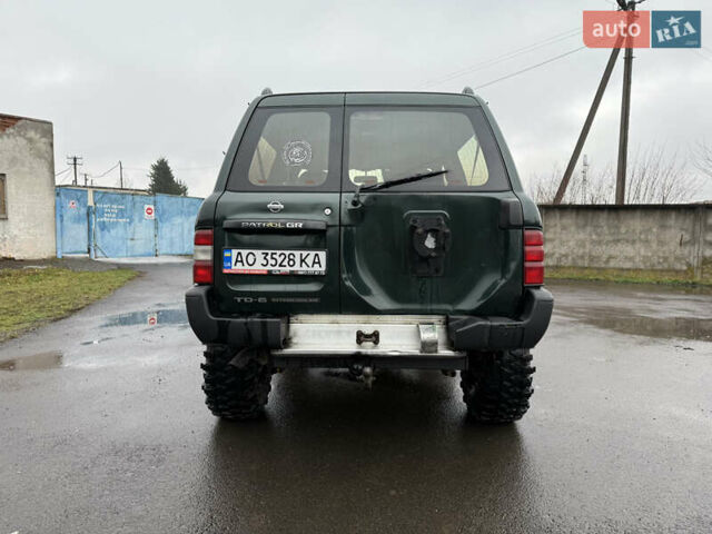 Зелений Ніссан Патрол, об'ємом двигуна 2.83 л та пробігом 254 тис. км за 11800 $, фото 8 на Automoto.ua