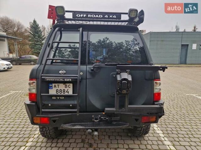 Зелений Ніссан Патрол, об'ємом двигуна 2.8 л та пробігом 198 тис. км за 19999 $, фото 11 на Automoto.ua