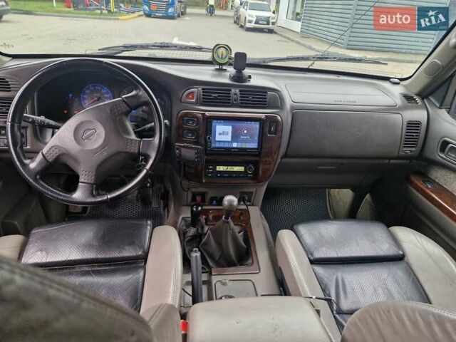 Зелений Ніссан Патрол, об'ємом двигуна 2.8 л та пробігом 198 тис. км за 19999 $, фото 21 на Automoto.ua