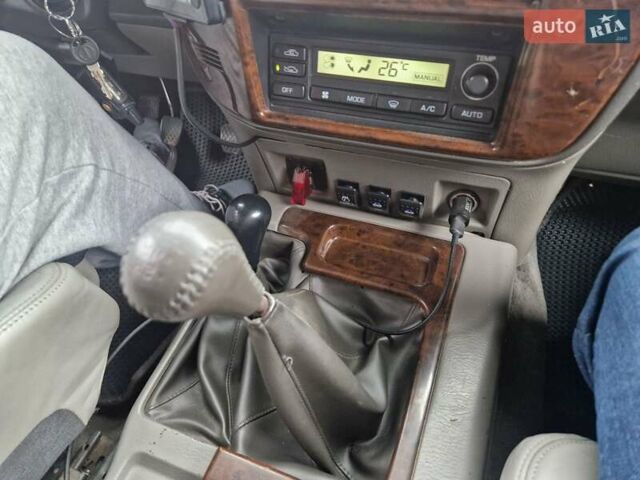 Зелений Ніссан Патрол, об'ємом двигуна 2.8 л та пробігом 198 тис. км за 19999 $, фото 31 на Automoto.ua